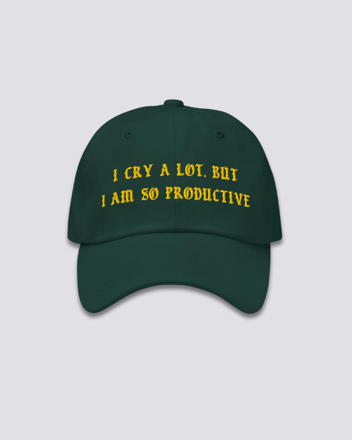 Green cap with yellow text on a light gray background