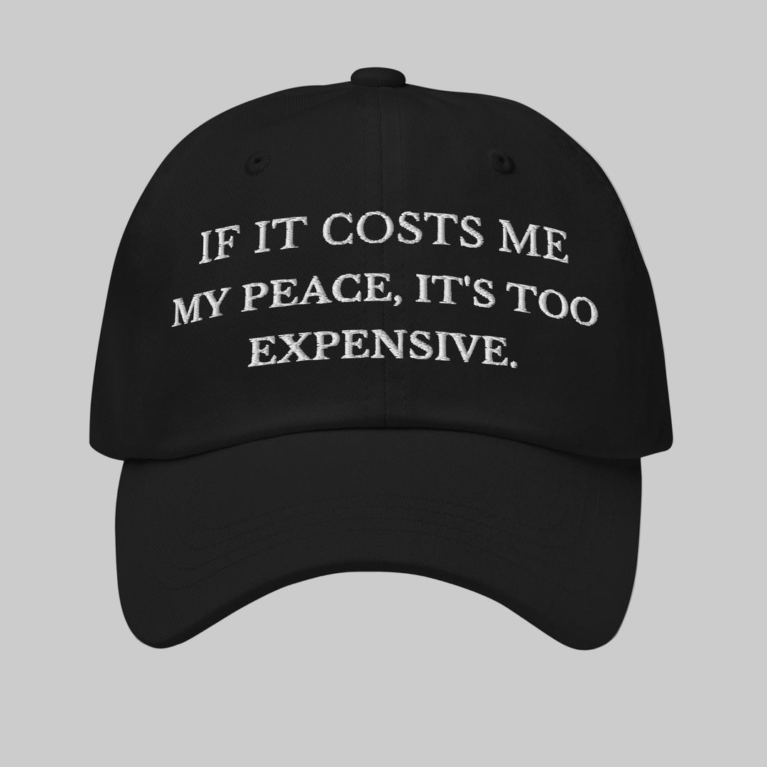 Black cap with white text on a light gray background