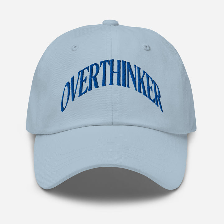 Light blue cap with 'OVERTHINKER' text on a white background