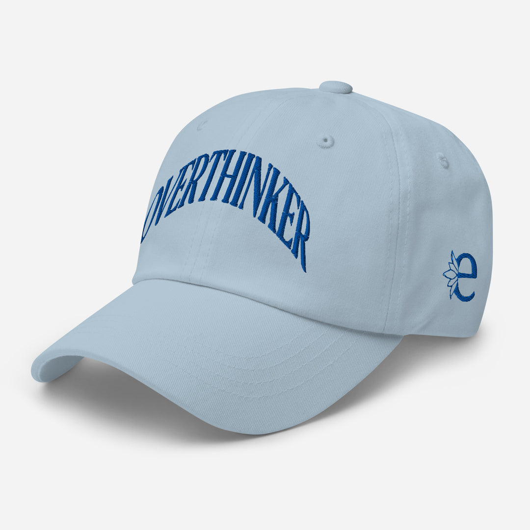 Light blue cap with 'OVERTHINKER' text and logo on a light gray background