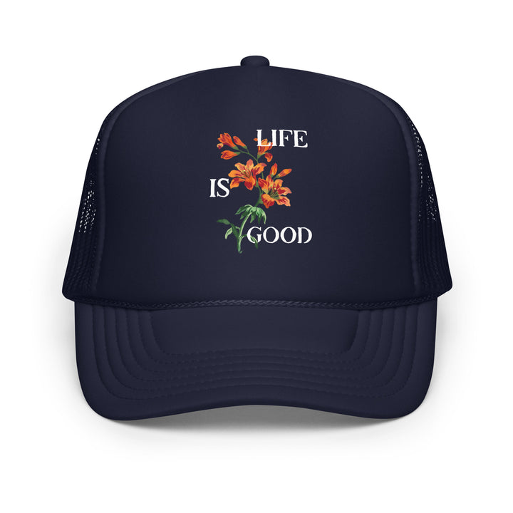 Navy blue cap with 'Life is Good' and floral design on a white background