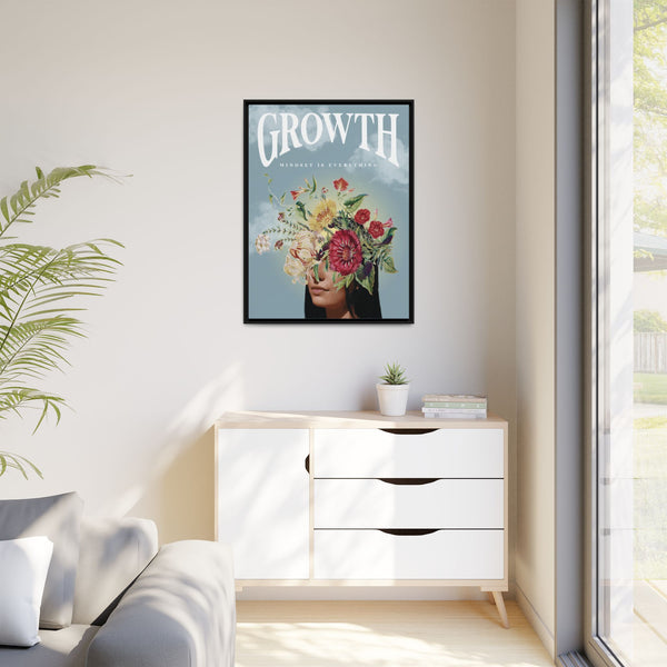 Framed poster with floral design and text on a wall above a white cabinet.