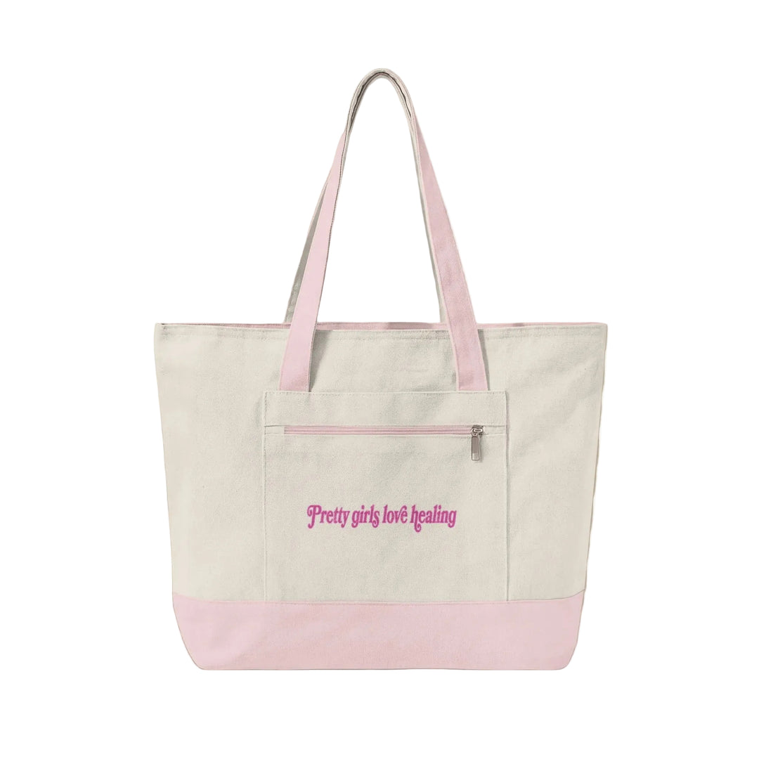 Beige tote bag with pink accents and text on a beige background