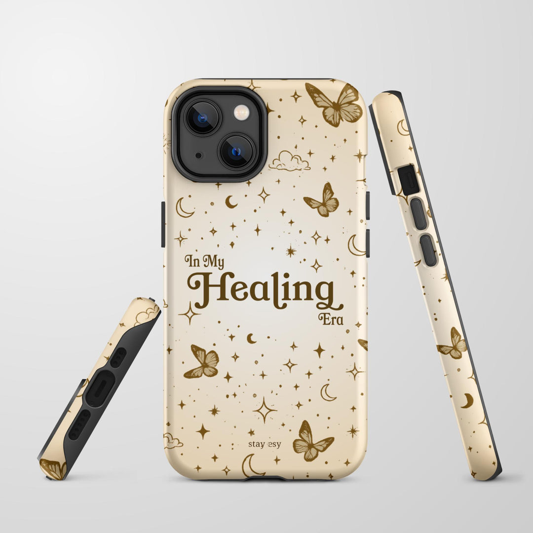 In My Healing Era cream celestial tough iPhone case with golden butterflies, moons and stars by Stay Esy