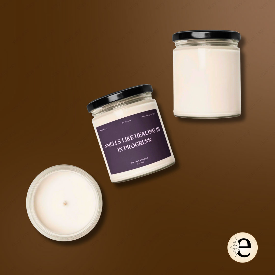 Three candles with labels on a brown background