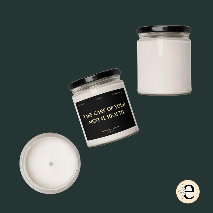 Three candles with labels on a dark background