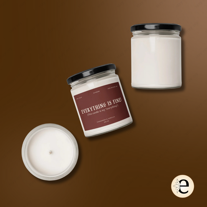Three candles with 'Everything is Fine' label on a brown background