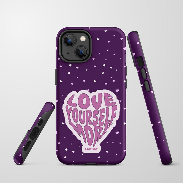 Love Yourself More purple tough iPhone case with hand-lettered heart and scattered pink hearts by Stay Esy