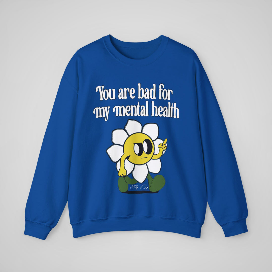 Blue sweatshirt with a cartoon character and text on a gray background