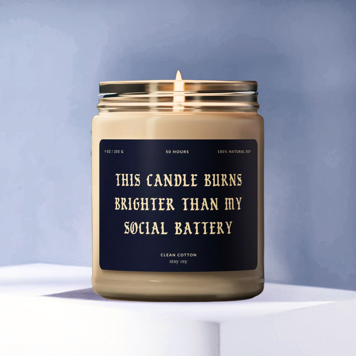Candle with a humorous label on a light blue background