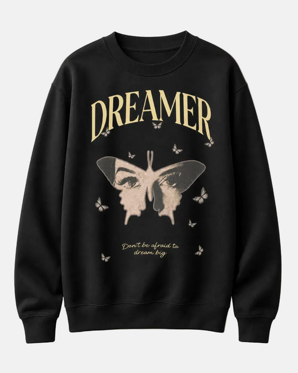 Black sweatshirt with butterfly graphic and 'Dreamer' text on a beige background