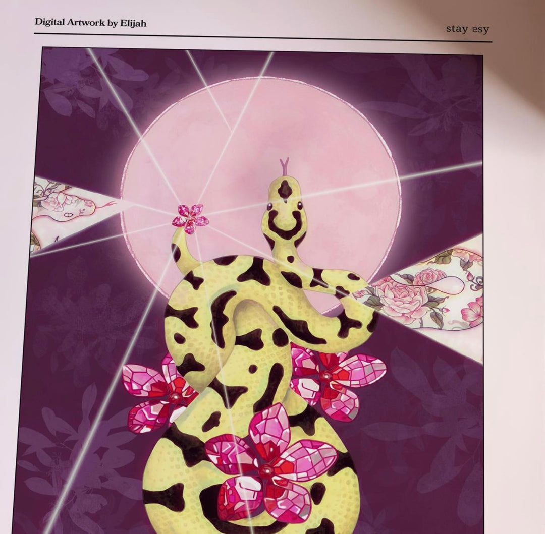A stylized artwork showing a yellow snake with black spots coiled among pink and purple flowers, set against a dark purple background with a pale pink circular shape and radiating white lines. The image appears to be a digital art print or artwork preview with text at the top reading &