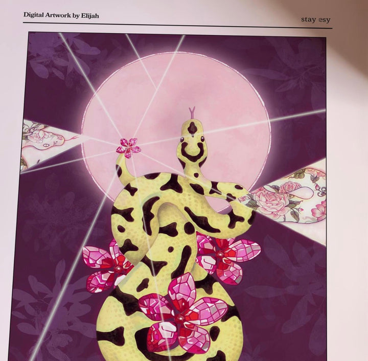 A stylized artwork showing a yellow snake with black spots coiled among pink and purple flowers, set against a dark purple background with a pale pink circular shape and radiating white lines. The image appears to be a digital art print or artwork preview with text at the top reading &