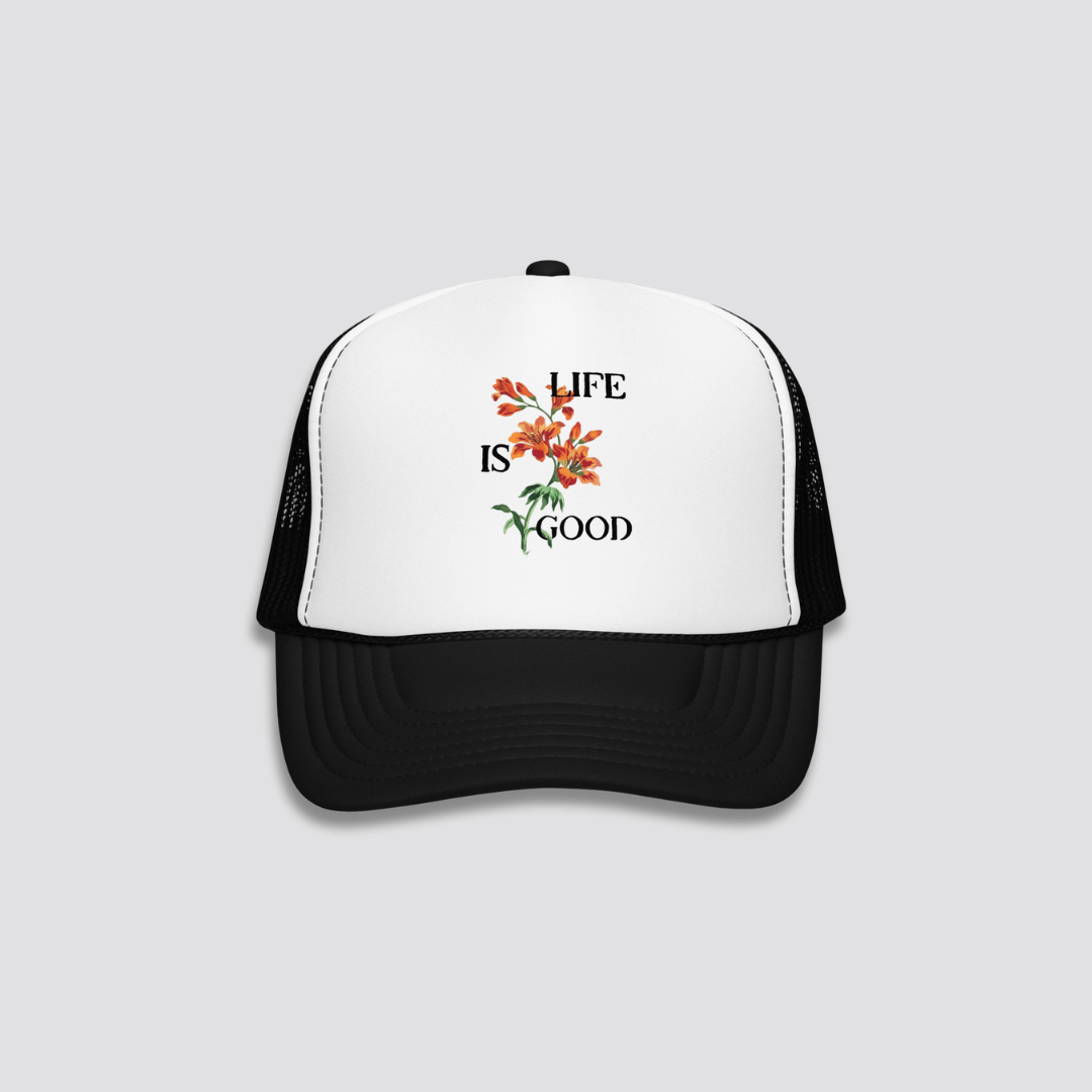 Trucker hat with floral design and 'Life is Good' text on a white background