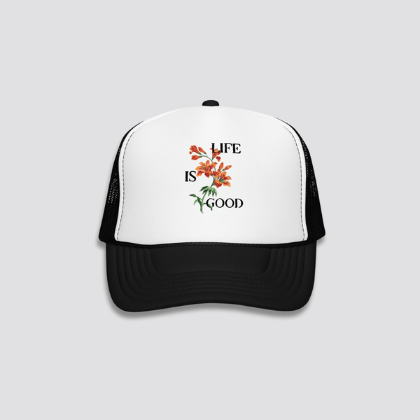 Trucker hat with floral design and 'Life is Good' text on a white background