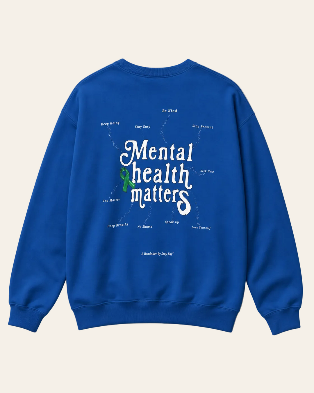 Blue sweatshirt with 'Mental health matters' text on a beige background