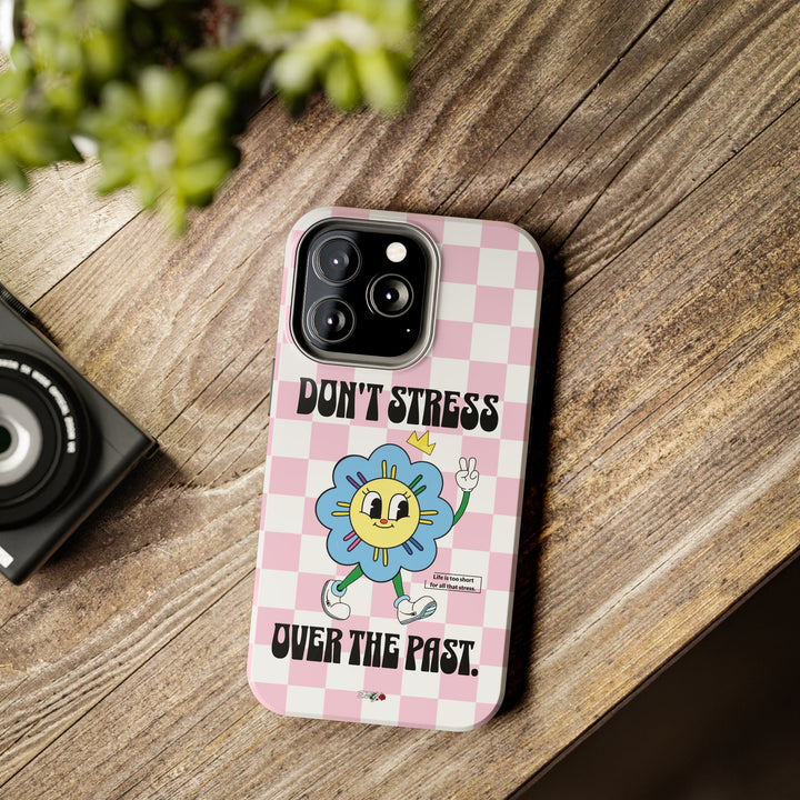 Lifestyle shot of the Don’t Stress Over The Past iPhone case, highlighting its motivational design.
