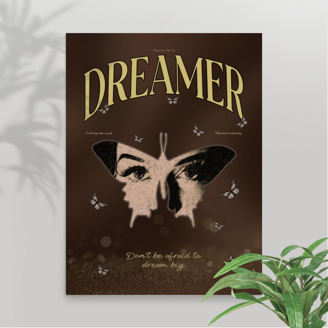Poster with butterfly design and 'Dreamer' text on a brown background