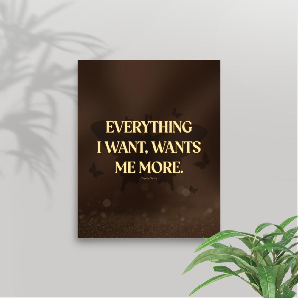 Motivational poster with 'Everything I want, wants me more' quote on a dark background with butterflies.