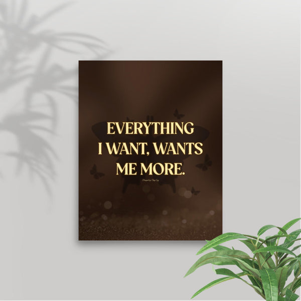 Motivational poster with 'Everything I want, wants me more' quote on a dark background with butterflies.