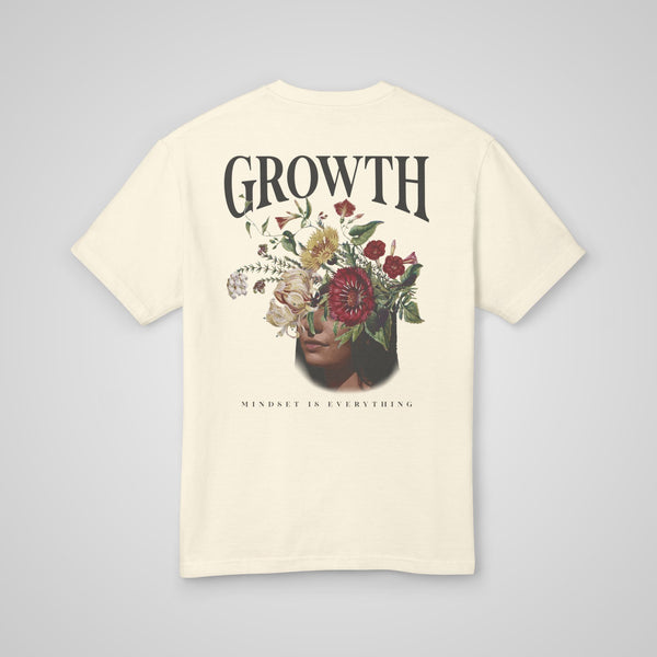 Back view of the Growth Mindset Heavyweight Tee in faded cream, a unisex motivational streetwear piece.
