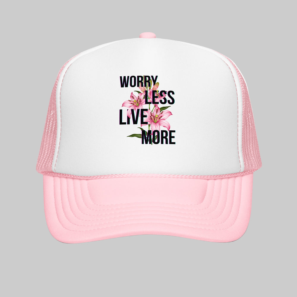 Pink and white trucker hat with floral design and text on a white background