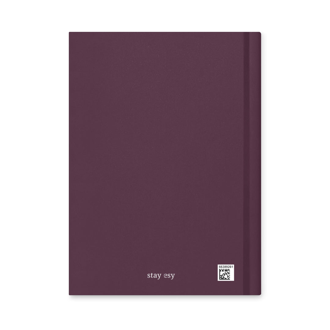 Purple notebook with &