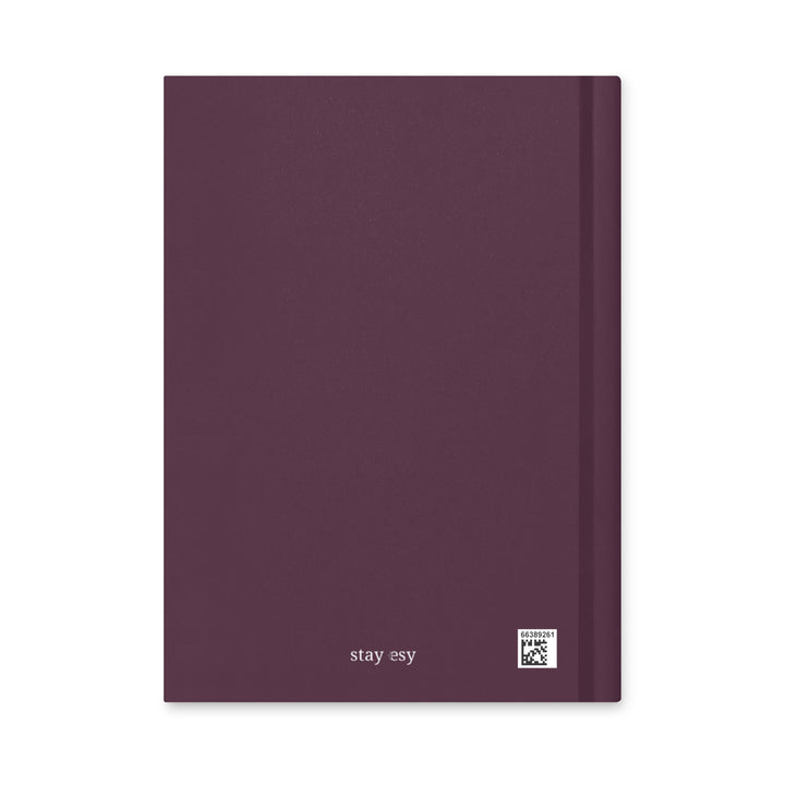 Purple notebook with &