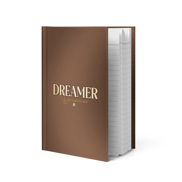 Brown notebook with 'Dreamer' text on a white background