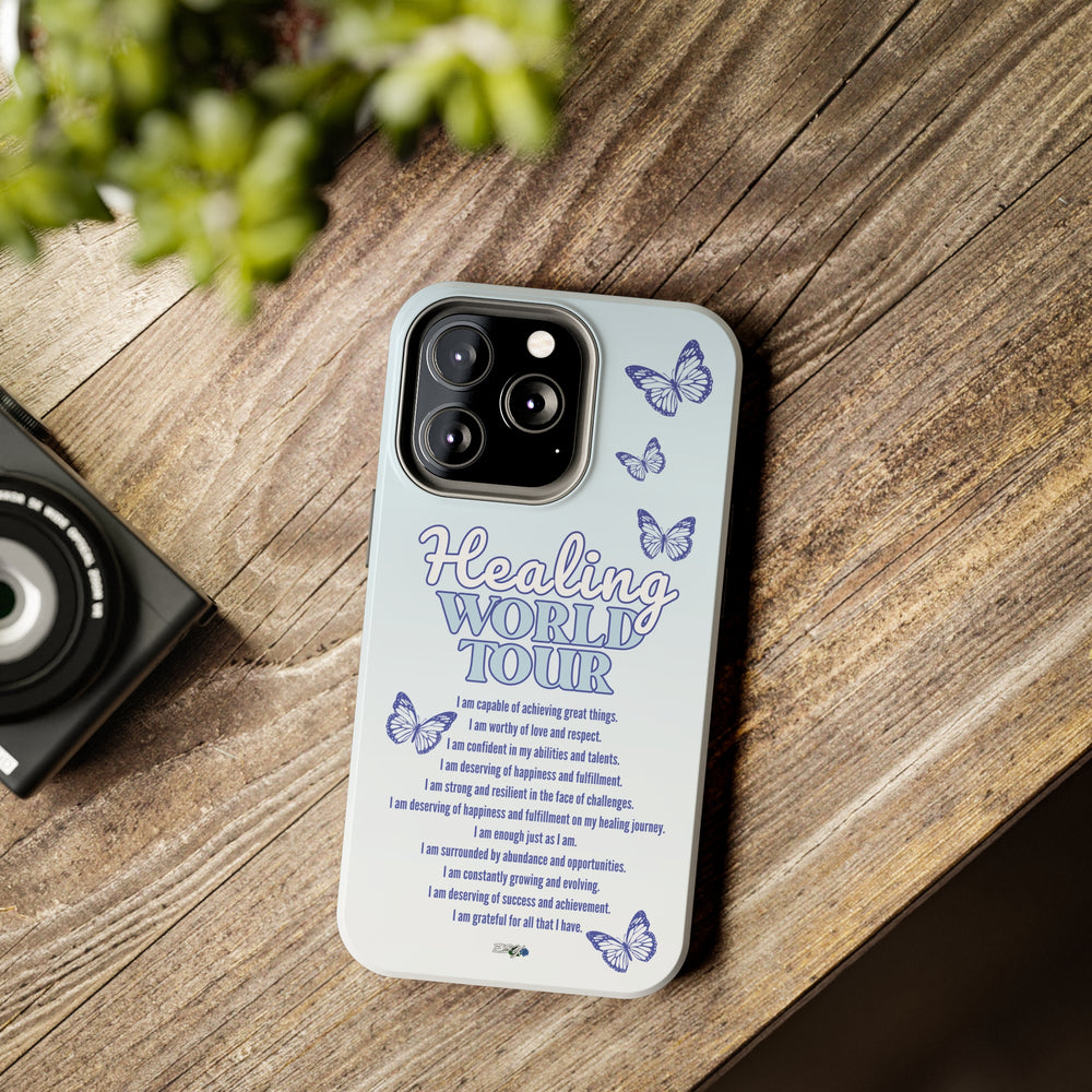 A lifestyle shot showcasing the Healing World Tour iPhone case in everyday use.

