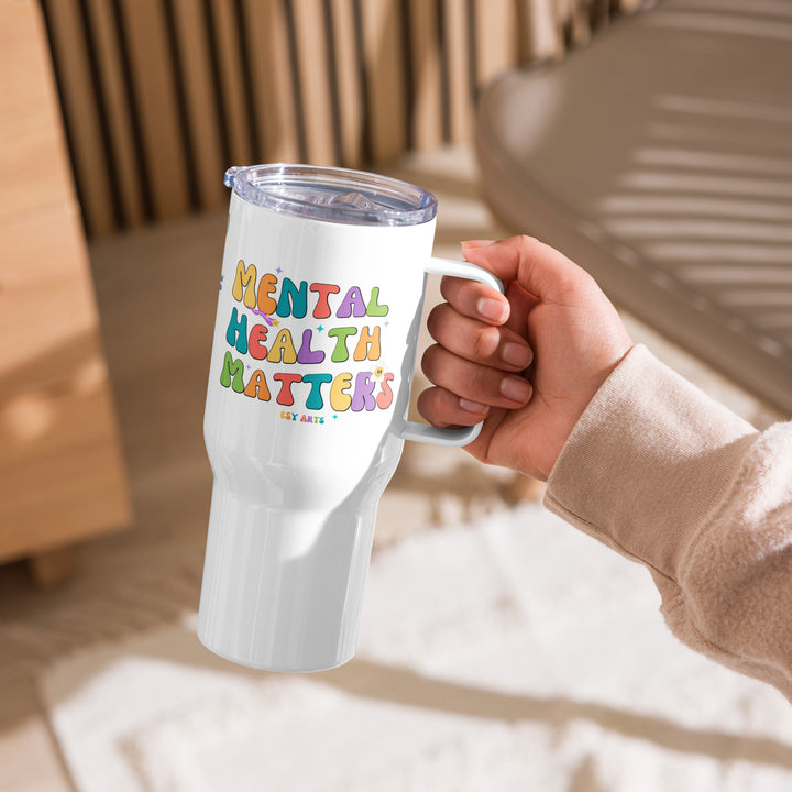 A person holding the Mental Health Matters tumbler cup, showcasing its perfect size for daily use.

