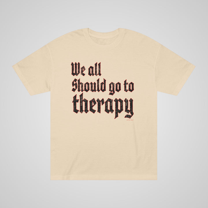 We All Should Go To Therapy sand color mental health awareness t-shirt – front view