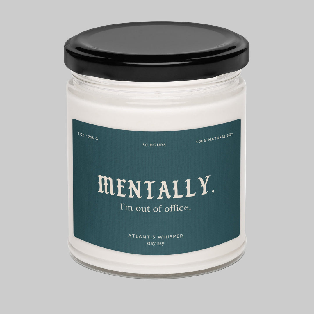 Candle jar with a label reading 'Mentally, I'm out of office.' on a white background