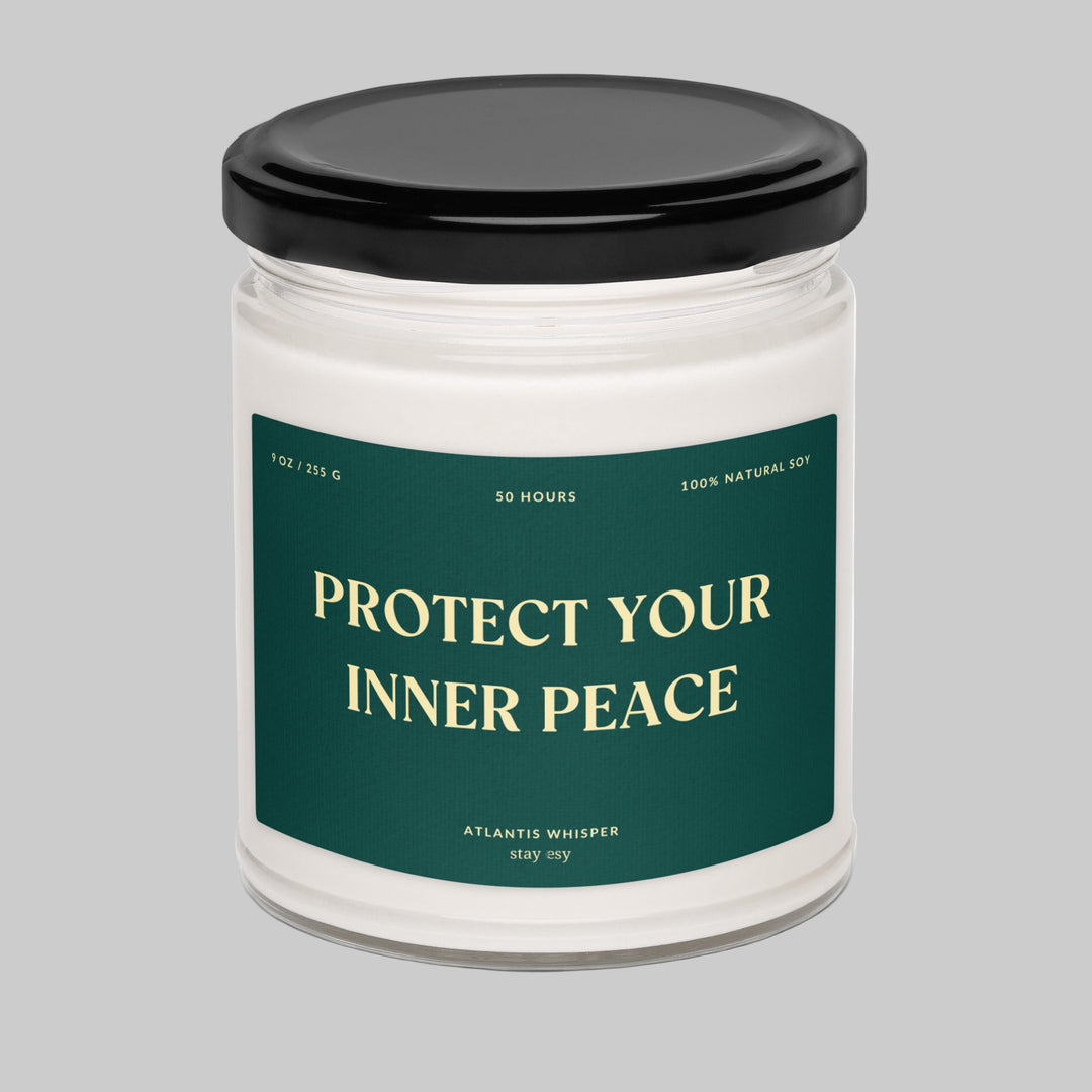 Candle jar with a black lid and 'Protect Your Inner Peace' label on a white background