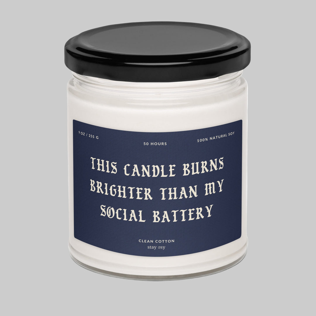 Candle jar with a humorous label on a white background