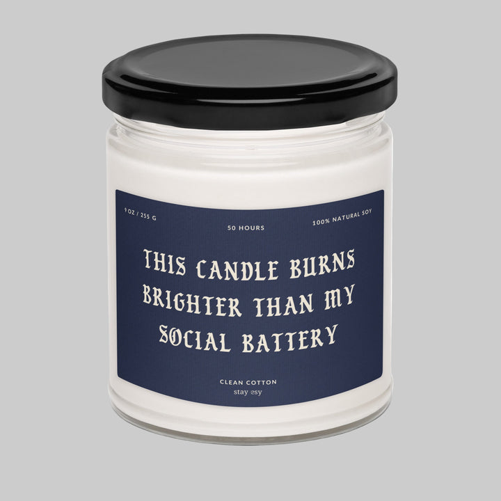 Candle jar with a humorous label on a white background