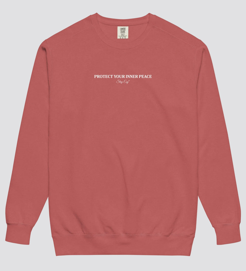 Crimson unisex sweatshirt small "Protect your inner peace"graphic text in the middle of chest with "Stay Esy" trademark in script font underneath.