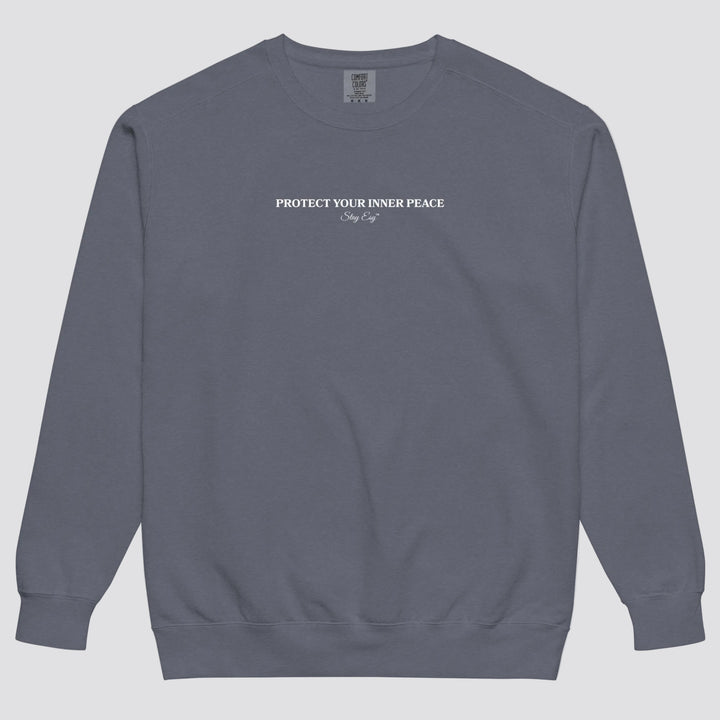 Denim unisex sweatshirt small "Protect your inner peace"graphic text in the middle of chest with "Stay Esy" trademark in script font underneath.