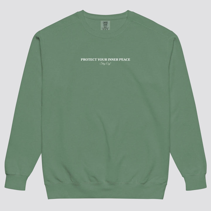 Light Green unisex sweatshirt small "Protect your inner peace"graphic text in the middle of chest with "Stay Esy" trademark in script font underneath.