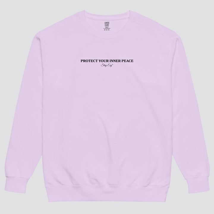 Orchid unisex sweatshirt small "Protect your inner peace"graphic text in the middle of chest with "Stay Esy" trademark in script font underneath.