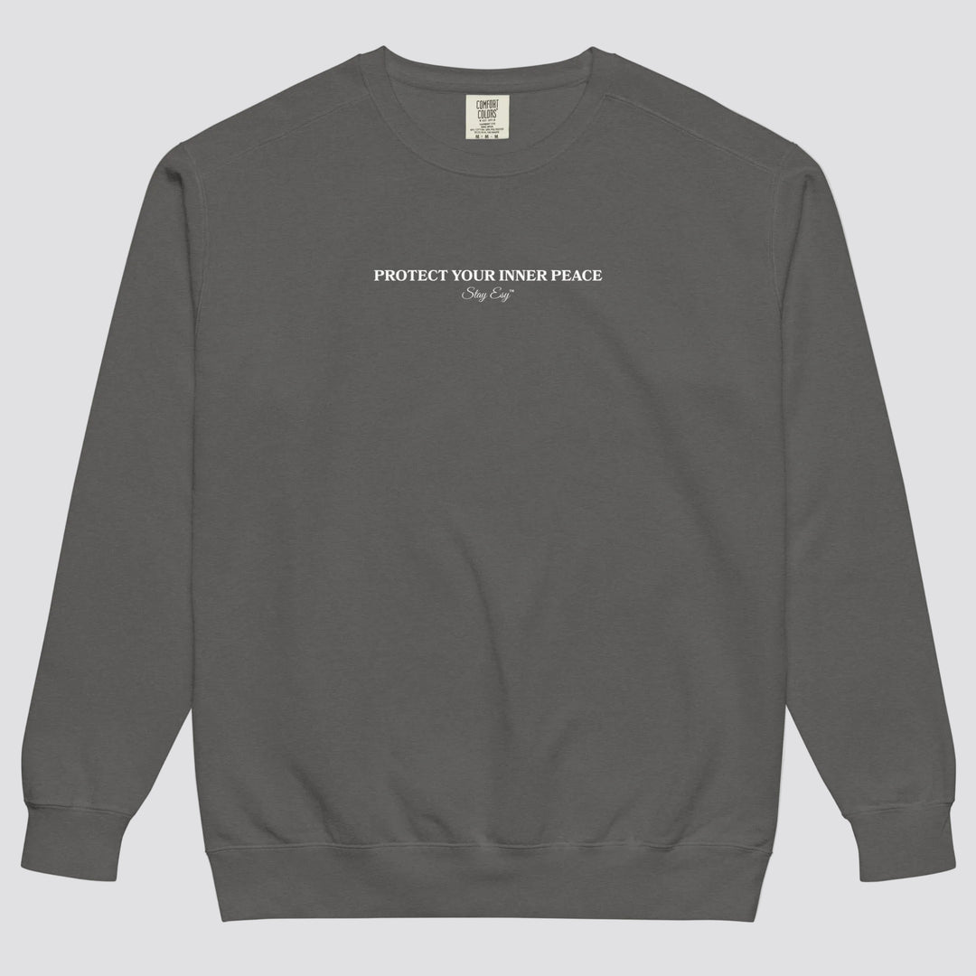 Pepper unisex sweatshirt small "Protect your inner peace"graphic text in the middle of chest with "Stay Esy" trademark in script font underneath.