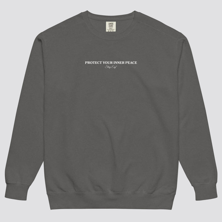 Pepper unisex sweatshirt small "Protect your inner peace"graphic text in the middle of chest with "Stay Esy" trademark in script font underneath.