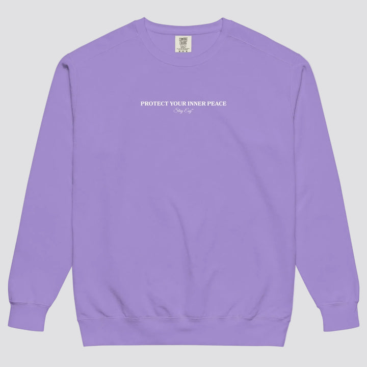 Violet unisex sweatshirt small "Protect your inner peace"graphic text in the middle of chest with "Stay Esy" trademark in script font underneath.