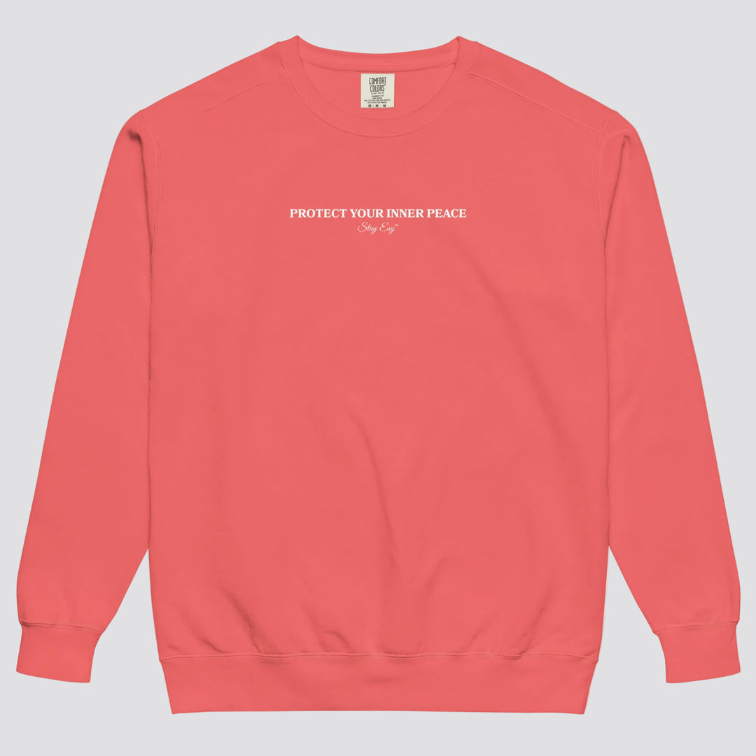 Watermelon unisex sweatshirt small "Protect your inner peace"graphic text in the middle of chest with "Stay Esy" trademark in script font underneath.