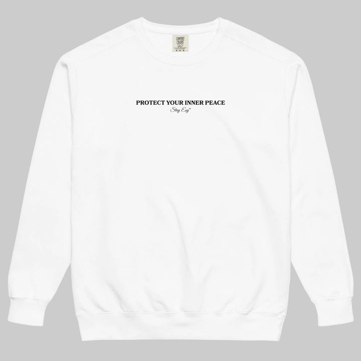 White unisex sweatshirt small "Protect your inner peace"graphic text in the middle of chest with "Stay Esy" trademark in script font underneath.