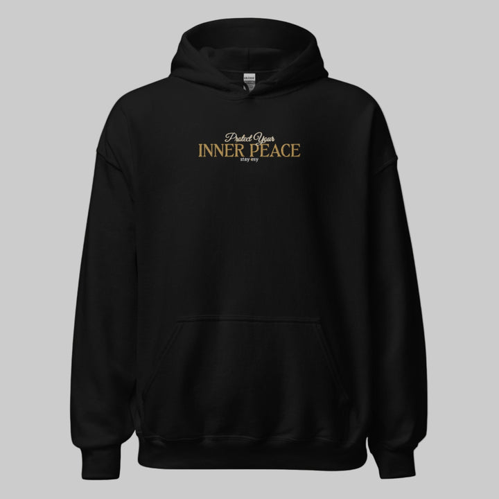 Black hoodie with 'Protect Your Inner Peace' text on a white background