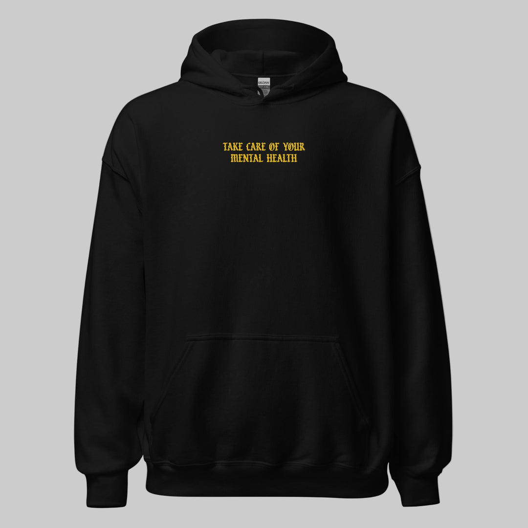 Black hoodie with yellow text 'Take care of your mental health' on a white background