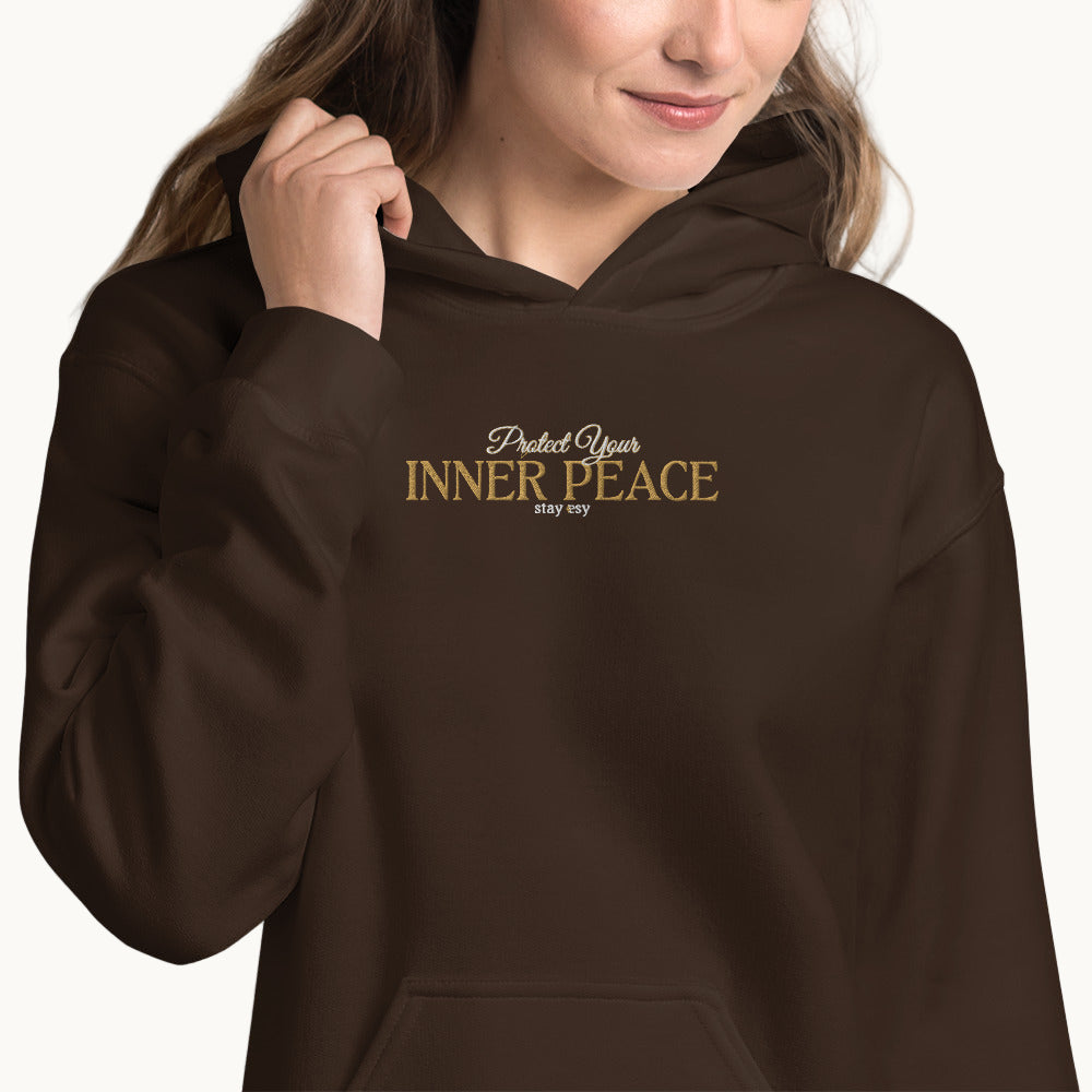 Brown hoodie with 'Protect Your INNER PEACE' text on a white background