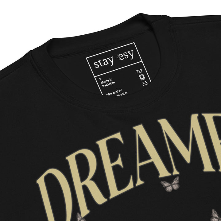 Close up of Black sweatshirt with &
