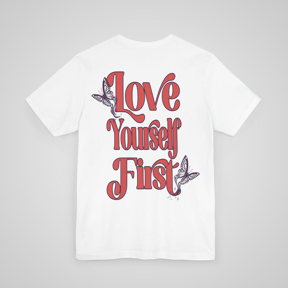 Back view of Love Yourself First Lightweight Tee in white, featuring a self-care and mental health awareness design.